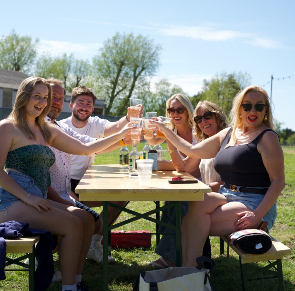 friends enjoying english wine at wildshark wine festival